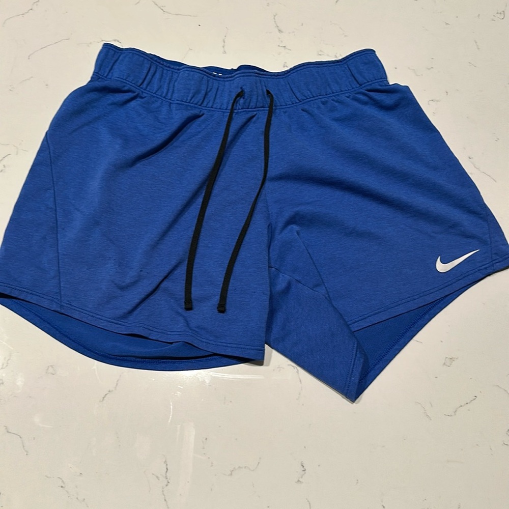 Blue Nike shorts